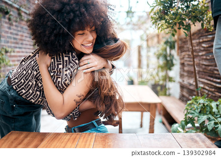 Woman, friends and hug at coffee shop outdoor for hello greeting, reunion or happy connection. Female people, embrace at restaurant table for bonding meet up for casual hangout, weekend in summer 139302984