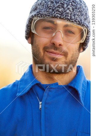 Man, construction worker and portrait for protection eyewear for building repair, maintenance in industry. Male person, face and glasses or safety gear as handyman contractor on site, outdoor for job 139303250