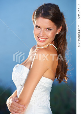Bride, portrait and smile outdoor for love, commitment and celebration ceremony with confidence. Jewelry, woman and happy from future marriage, romance and formal event in a garden with a dress Bride, portrait and smile outdoor for love, commitment and celebration ceremony with confidence. Jewelry, woman and happy from future marriage, romance and formal event in a garden with a dress 139303502