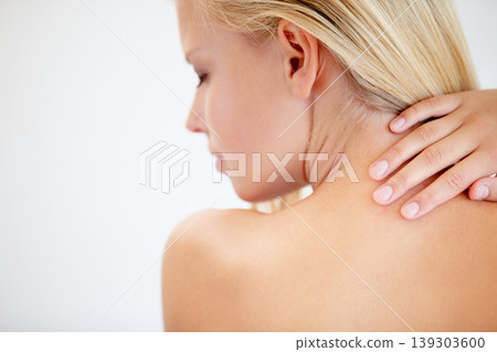 Girl, skincare and touch back in studio with neck, eyes closed and dermatology by white background. Woman, model and beauty with peace, cosmetic change and transformation with glow for wellness 139303600