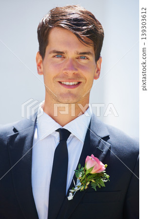 Groom man, portrait and outdoor at wedding in suit, rose and happy for celebration, event or party. Person, smile and tuxedo for choice, marriage and commitment to relationship with floral decoration 139303612