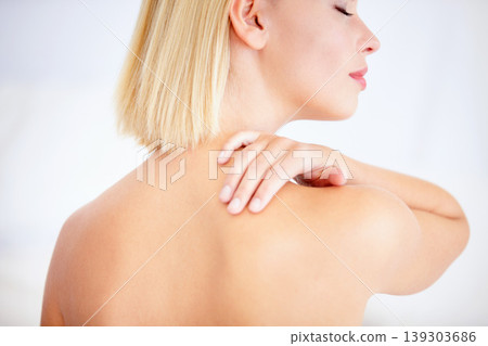 Woman, skincare and touch shoulder in studio with back, eyes closed and beauty by white background. Girl, model and blonde with smooth skin, cosmetic change and transformation with glow for wellness Woman, skincare and touch shoulder in studio with back, eyes closed and beauty by white background. Girl, model and blonde with smooth skin, cosmetic change and transformation with glow for wellness 139303686
