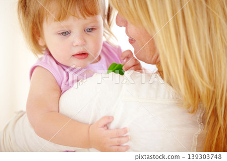 Woman, holding and baby girl in home for love or safety care, childhood development and motherhood parenting. Female person, daughter and security support for relax mama, together or bonding trust Woman, holding and baby girl in home for love or safety care, childhood development and motherhood parenting. Female person, daughter and security support for relax mama, together or bonding trust 139303748