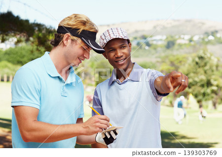 Sports, golf and athletes in discussion on field writing notes for competition or tournament strategy. Fitness, smile and professional happy male players talking for hobby on an outdoor course. Sports, golf and athletes in discussion on field writing notes for competition or tournament strategy. Fitness, smile and professional happy male players talking for hobby on an outdoor course. 139303769