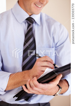Hands, writing and paperwork for business man, smile and thinking with notes, schedule or ideas in workplace. Entrepreneur, accountant and documents with pen, brainstorming and checklist in office Hands, writing and paperwork for business man, smile and thinking with notes, schedule or ideas in workplace. Entrepreneur, accountant and documents with pen, brainstorming and checklist in office 139303770