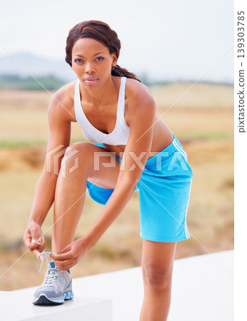 Runner girl, tie shoes and portrait outdoor for training, exercise and fitness with safety, ready and start. Black woman, sports sneakers and shoelace for workout, thinking and health in countryside 139303785