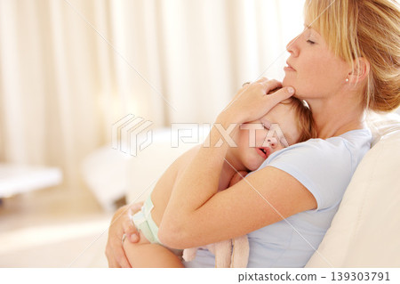 Woman, baby and sleep on chest in home for relax or childhood development, peace or mother love. Female person, kid and nap for secure safety or bonding parenting for young care, comfort or tired Woman, baby and sleep on chest in home for relax or childhood development, peace or mother love. Female person, kid and nap for secure safety or bonding parenting for young care, comfort or tired 139303791