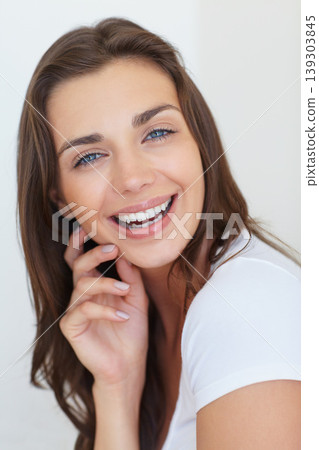 Woman, portrait and happy in studio with beauty, cosmetics treatment and glowing skin on white background. Person, model and face with laughing or smile for skincare and dermatology with confidence Woman, portrait and happy in studio with beauty, cosmetics treatment and glowing skin on white background. Person, model and face with laughing or smile for skincare and dermatology with confidence 139303845