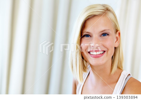 Relax, happy and portrait of woman in home for positive mindset, confidence and smile. Attractive, apartment and face of person in living room with happiness for free time, weekend and holiday 139303894