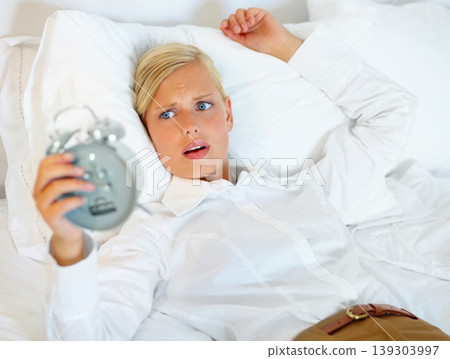 Woman, business or late alarm clock, bedroom or home with urgent appointment, professional or career. Person, employee or worker with anxiety, stress or worried girl in panic with wake up time or bed 139303997