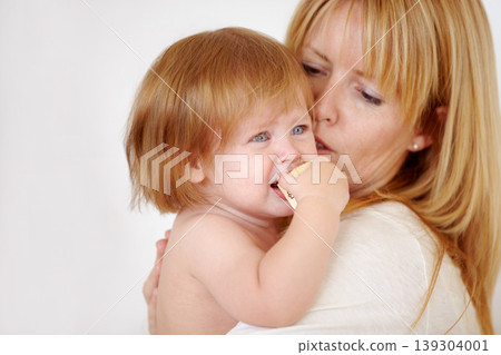 Woman, carrying and baby in home for love or safety care, childhood development and motherhood parenting. Female person, daughter and security support or play toy, together trust or bonding holding Woman, carrying and baby in home for love or safety care, childhood development and motherhood parenting. Female person, daughter and security support or play toy, together trust or bonding holding 139304001