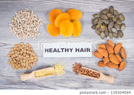 Nutritious food as source differents vitamins and minerals for healthy hair Nutritious food as source differents vitamins and minerals for healthy hair 139304084