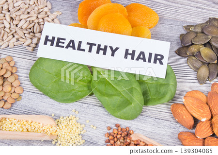 Nutritious food as source differents vitamins and minerals for healthy hair 139304085