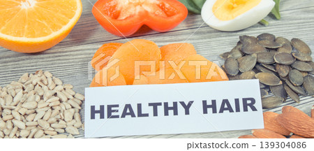 Nutritious food as source differents vitamins or minerals for healthy and lush hair Nutritious food as source differents vitamins or minerals for healthy and lush hair 139304086