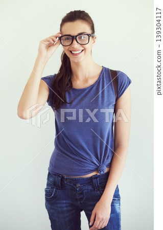 Portrait, fashion and woman with glasses, student and happiness on a white studio background. Human, girl and person with eyewear, optometry and break with university, mockup space and education Portrait, fashion and woman with glasses, student and happiness on a white studio background. Human, girl and person with eyewear, optometry and break with university, mockup space and education 139304117