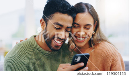 Couple, living room couch and happy with phone, smile and click for contact, meme and notification in home. Man, woman and texting with smartphone, reading and app for social network, video and relax 139304133