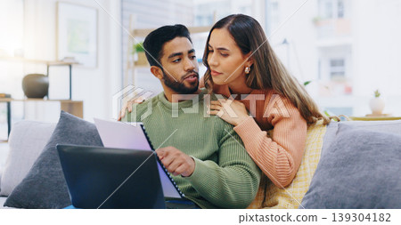 Laptop, finance and couple on sofa for planning, online banking and budget payment at home. Living room, marriage and man and woman with paperwork, bills and computer for insurance, savings and taxes 139304182