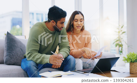 Laptop, documents and couple on sofa for taxes, online banking and budget payment. Living room, home and man and woman help with paperwork, bills and computer for insurance, savings and finances Laptop, documents and couple on sofa for taxes, online banking and budget payment. Living room, home and man and woman help with paperwork, bills and computer for insurance, savings and finances 139304261