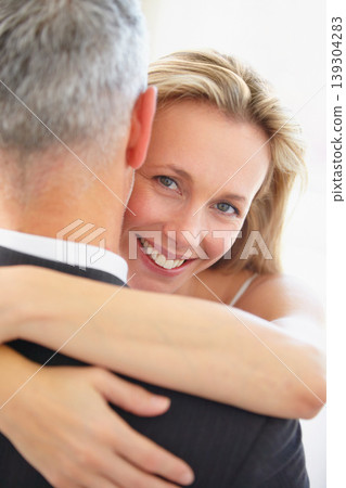 Happy woman, portrait and hug in marriage, love or embrace for honeymoon, romance or care together. Female person or bride hugging groom with smile in joy for wedding, support or trust in commitment Happy woman, portrait and hug in marriage, love or embrace for honeymoon, romance or care together. Female person or bride hugging groom with smile in joy for wedding, support or trust in commitment 139304283