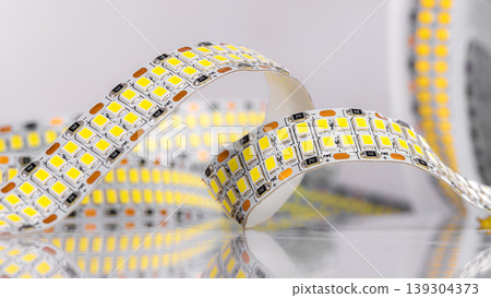 Led strip lights unrolling for modern illumination Led strip lights unrolling for modern illumination 139304373