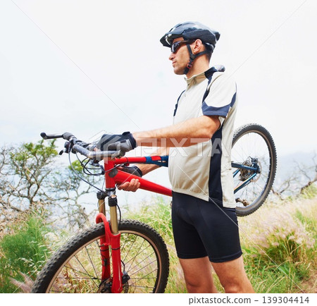 Sports, bike and fitness with a man in the mountains for cardio training, recreation or a summer hobby. Nature, cycling and freedom with a confident young athlete outdoor for eco friendly exercise 139304414