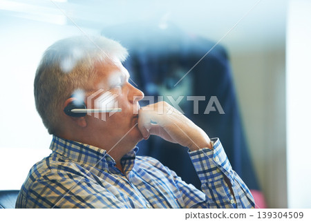 Senior businessman, headphones and thinking at call center for decision, choice or customer service at office. Mature man, consultant or agent in wonder or thought for online advice or help workplace Senior businessman, headphones and thinking at call center for decision, choice or customer service at office. Mature man, consultant or agent in wonder or thought for online advice or help workplace 139304509
