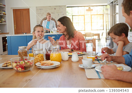 Food, breakfast and smile with a family at a dining room table in their home together for health or nutrition. Brother, sister and parents eating a meal in their apartment for love or morning bonding 139304543
