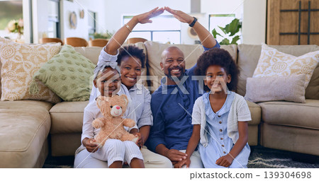 Black family, roof hands or portrait of happy kids in living room at home for support or insurance. Security, property investment or parents with children siblings for cover, safety or protection Black family, roof hands or portrait of happy kids in living room at home for support or insurance. Security, property investment or parents with children siblings for cover, safety or protection 139304698