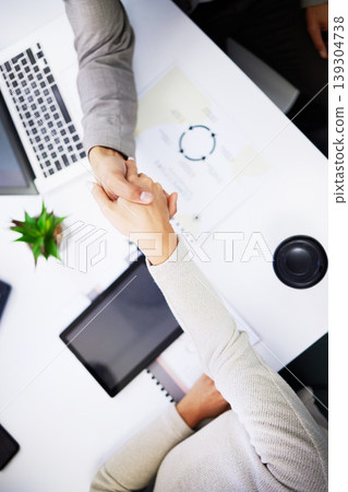 Client meeting, top view people and shaking hands for investment success, b2b contract deal or company acquisition. Business, teamwork and partner agreement, welcome or handshake in HR job interview Client meeting, top view people and shaking hands for investment success, b2b contract deal or company acquisition. Business, teamwork and partner agreement, welcome or handshake in HR job interview 139304738