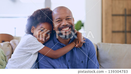Black family, hug or portrait of father with child in home to relax on holiday vacation with smile. Support, proud parent or African dad bonding with girl, love or happy kid in living room on sofa Black family, hug or portrait of father with child in home to relax on holiday vacation with smile. Support, proud parent or African dad bonding with girl, love or happy kid in living room on sofa 139304783