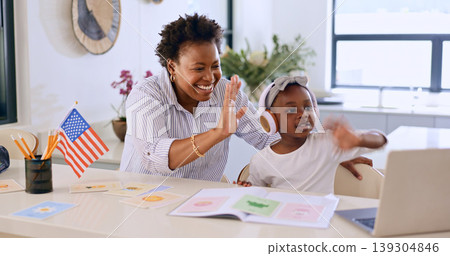 Child, woman or video call with laptop for education, streaming or home school for distance learning. Black people, mother or daughter for wave by kitchen counter, pc or online class for kindergarten Child, woman or video call with laptop for education, streaming or home school for distance learning. Black people, mother or daughter for wave by kitchen counter, pc or online class for kindergarten 139304846