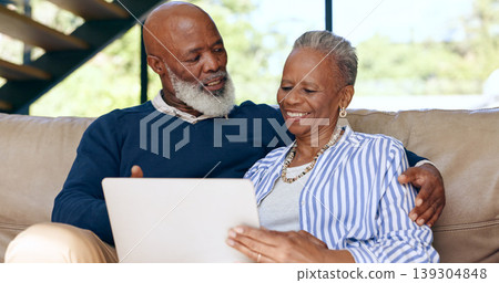 Love, hug and senior couple with laptop on sofa for streaming, search or subscription discussion at home. Happy, relax and elderly people in a living room online with social media, sign up or choice Love, hug and senior couple with laptop on sofa for streaming, search or subscription discussion at home. Happy, relax and elderly people in a living room online with social media, sign up or choice 139304848