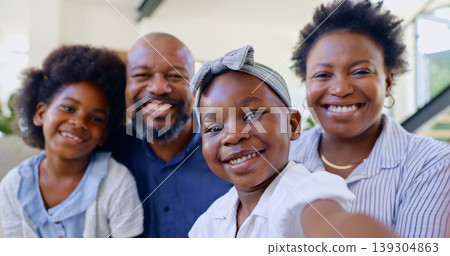 Home, selfie and black family with happiness, smile and cheerful with love, bonding together and profile picture. Face, parents and mother with father, children and girls with social media and relax Home, selfie and black family with happiness, smile and cheerful with love, bonding together and profile picture. Face, parents and mother with father, children and girls with social media and relax 139304863