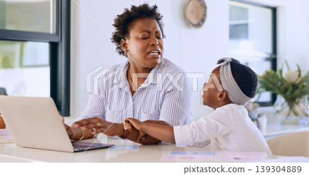 Mother, daughter and laptop or annoyed in home with remote work, email or research on kitchen counter. Black family, woman or frustrated with girl child for attention and noise in apartment or house 139304889