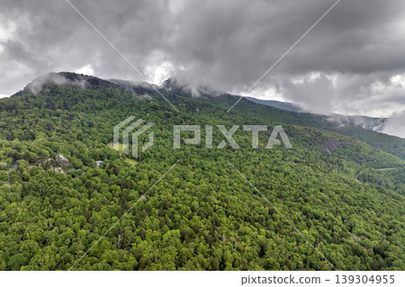 Grandfather Mountain rocky cliffs in Appalachian mountains in North Carolina. Summertime landscape of beautiful nature Grandfather Mountain rocky cliffs in Appalachian mountains in North Carolina. Summertime landscape of beautiful nature 139304955