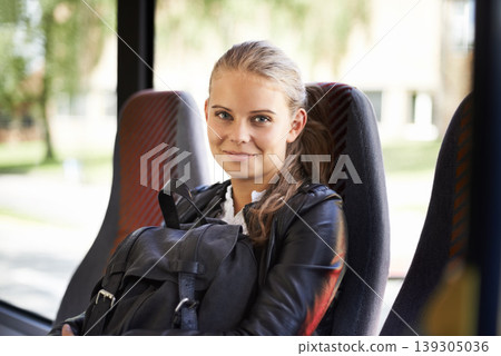 Student, portrait and transport to school on bus with a backpack and smile for education. Teenager, girl and happy journey on public transportation or travel to college, campus and university 139305036