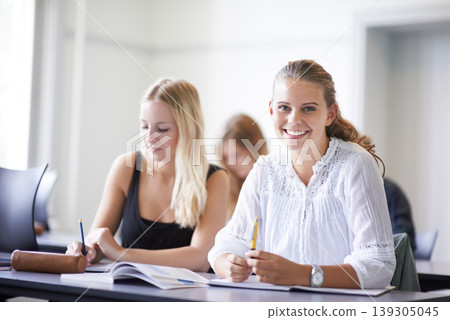 College student, portrait and learning with notes in class, lecture or people in education. University, classroom and face of happy woman with notebook, knowledge and studying in academy or school 139305045