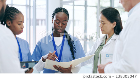 Medical, team and documents for meeting in hospital with collaboration, discussion and patient report. Healthcare, doctor and nurse in clinic with paperwork, teamwork and communication for planning 139305047