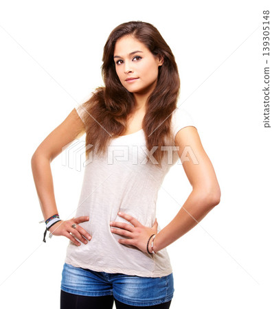 Confident, woman and portrait with casual fashion, style or hands on hips in white background of studio. Person, face and standing with shirt, jeans and model with pride in outfit for weekend Confident, woman and portrait with casual fashion, style or hands on hips in white background of studio. Person, face and standing with shirt, jeans and model with pride in outfit for weekend 139305148