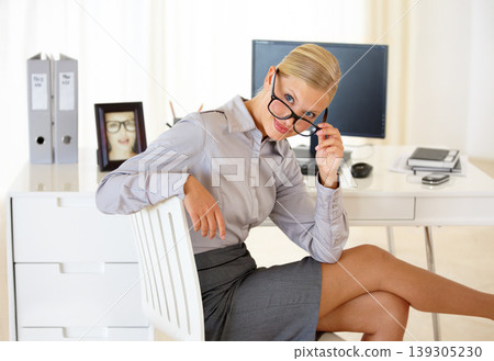 Business woman, portrait and confidence or smile, happy and proud in office, smart and glasses for vision. Female person, eyewear and positive mindset or stylish corporate fashion, face and humor Business woman, portrait and confidence or smile, happy and proud in office, smart and glasses for vision. Female person, eyewear and positive mindset or stylish corporate fashion, face and humor 139305230