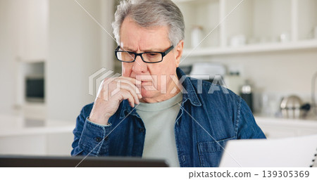 Thinking, laptop or elderly man with paperwork planning for financial spreadsheet or retirement investment. Documents, web or senior person reading news online or savings account or banking in home 139305369