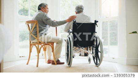 Elderly man, comfort and woman in wheelchair, touch and support partner in retirement with love. Senior couple, care and hand for together in marriage, sickness and health for wellness in family home Elderly man, comfort and woman in wheelchair, touch and support partner in retirement with love. Senior couple, care and hand for together in marriage, sickness and health for wellness in family home 139305379