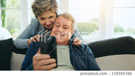 Phone, senior or happy couple on social media on couch for communication, meme or internet connection. Home, mature man or woman on mobile app to search, relax or scroll online on sofa in living room 139305390