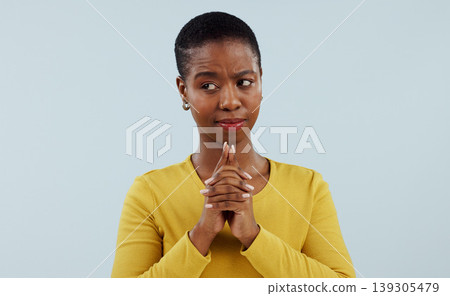 Doubt, wish and thinking, black woman in studio with hope for opportunity, deal or good news prayer. Hands together, emoji and person with ideas, offer and faith on white background with confusion. 139305479