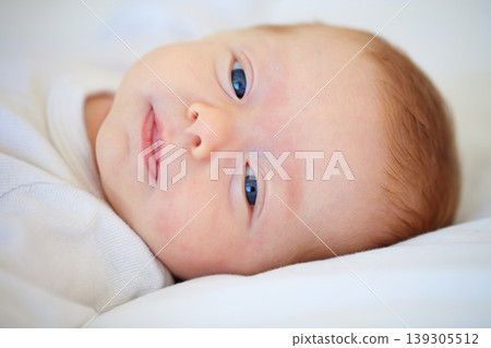 Closeup, portrait and baby for wake up in bedroom for sleep, relax or peaceful in morning. Infant, happy or good dream from nap with calm, care or hope for child growth, cognitive and development Closeup, portrait and baby for wake up in bedroom for sleep, relax or peaceful in morning. Infant, happy or good dream from nap with calm, care or hope for child growth, cognitive and development 139305512