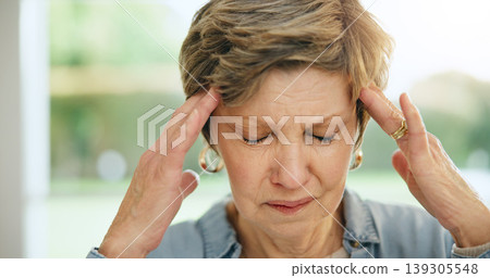 Frustrated senior woman, headache and mistake in stress, burnout or anxiety and depression at home. Closeup of mature female person with migraine, pain or sore head in mental health or fail at house 139305548