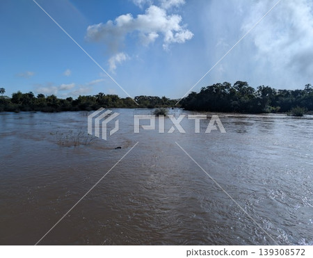 A view of the surface of the bubbling Iguazu River in the sunlight at Iguazu National Park and Reserve in Argentina in June 139308572