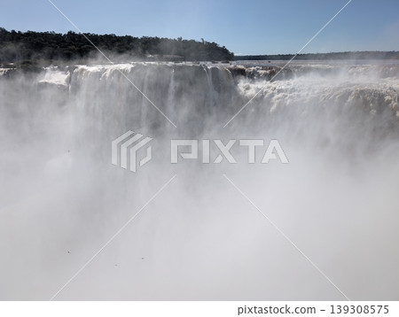 Mist from the spray of Iguazu Falls in Iguazu National Park and Reserve in Argentina in June. Close-up 139308575