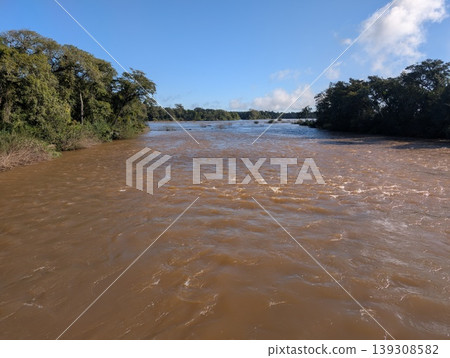 A view of the full-flowing Iguazu River in Iguazu National Park and Reserve in Argentina in June A view of the full-flowing Iguazu River in Iguazu National Park and Reserve in Argentina in June 139308582