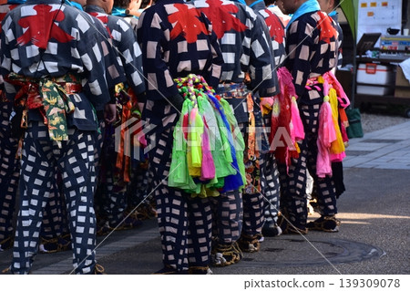 Men participating in the Inuyama Spring Festival in Inuyama City, Aichi Prefecture, are seen wearing traditional happi coats, straw sandals, and brightly colored obi belts. Men participating in the Inuyama Spring Festival in Inuyama City, Aichi Prefecture, are seen wearing traditional happi coats, straw sandals, and brightly colored obi belts. 139309078